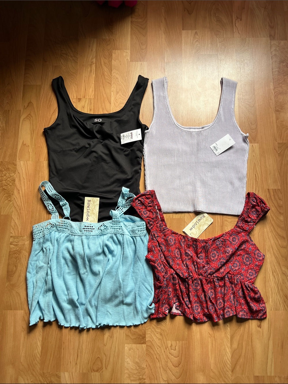 3 NWT tops and 1 NWT bodysuit